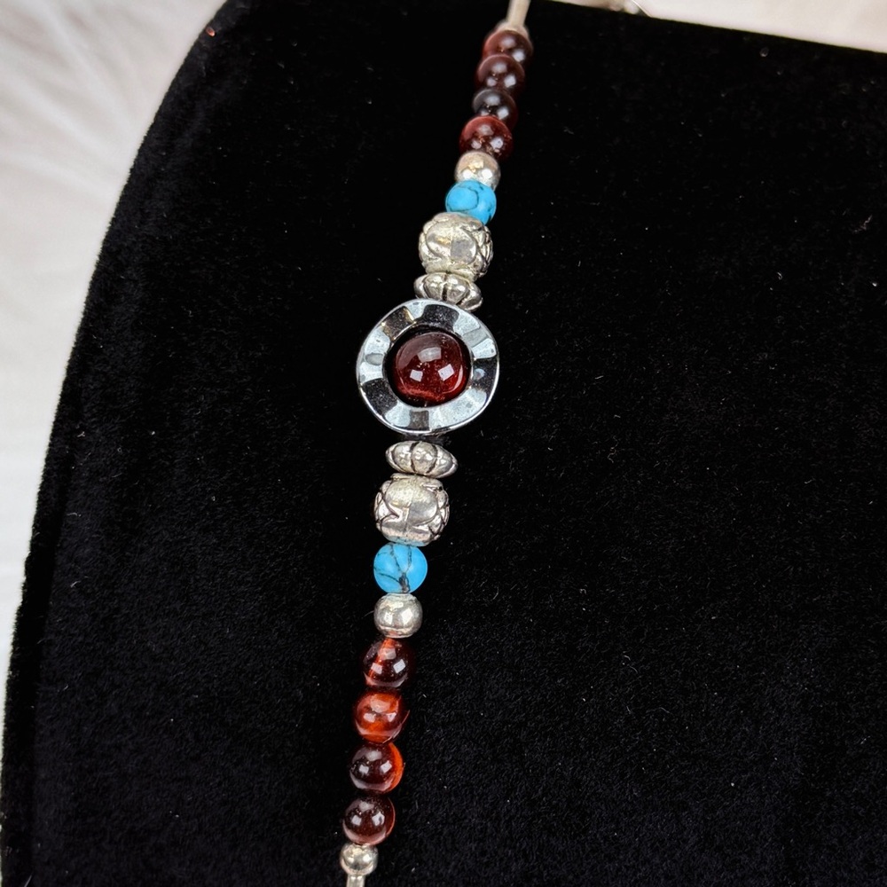 Silvertone and blue liquid silver southwestern style bracelet